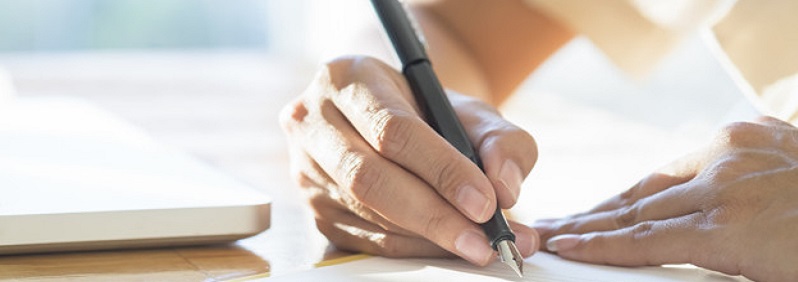 Asian Business Woman Signing A Contract Document Making A Deal.